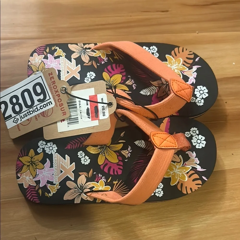 ZeroXposur Orange and Black Flip Flops Vibrant Style